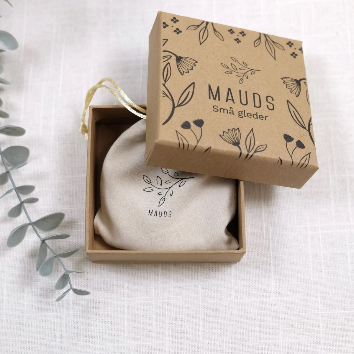 Rullemålbånd i eksklusivt skinn med avtagbar snor